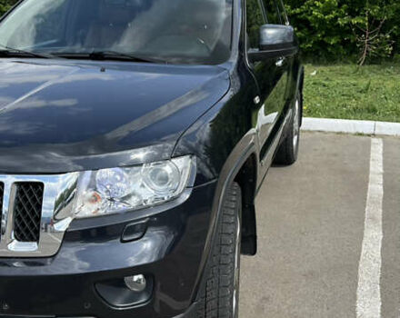 Чорний Джип Grand Cherokee, об'ємом двигуна 2.99 л та пробігом 150 тис. км за 18800 $, фото 1 на Automoto.ua