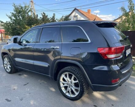 Чорний Джип Grand Cherokee, об'ємом двигуна 3 л та пробігом 255 тис. км за 16100 $, фото 1 на Automoto.ua