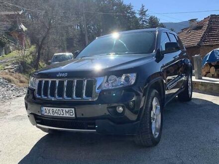 Чорний Джип Grand Cherokee, об'ємом двигуна 3 л та пробігом 195 тис. км за 19900 $, фото 1 на Automoto.ua