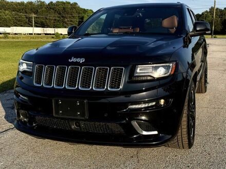 Джип Grand Cherokee 2014 у Кривому Розі на Automoto.ua Чорний Джип Grand Cherokee, об'ємом двигуна 6.4 л та пробігом 90 тис. км за 8900 $, фото 1 на Automoto.ua