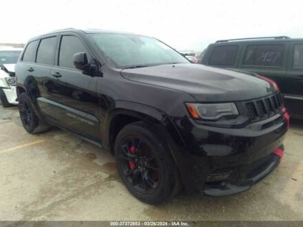 Чорний Джип Grand Cherokee, об'ємом двигуна 6.4 л та пробігом 78 тис. км за 5700 $, фото 1 на Automoto.ua