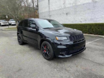 Чорний Джип Grand Cherokee, об'ємом двигуна 6.4 л та пробігом 64 тис. км за 20000 $, фото 1 на Automoto.ua