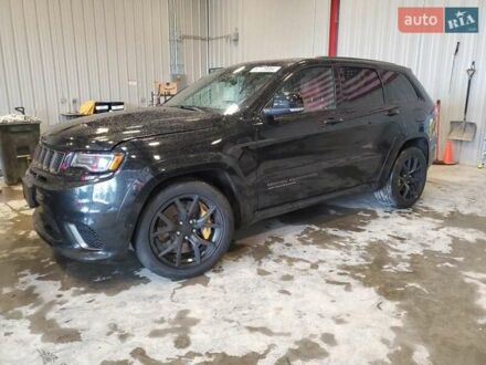 Чорний Джип Grand Cherokee, об'ємом двигуна 6.2 л та пробігом 131 тис. км за 4300 $, фото 1 на Automoto.ua