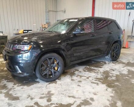 Черный Джип Гранд Чероки, объемом двигателя 6.2 л и пробегом 131 тыс. км за 4300 $, фото 1 на Automoto.ua