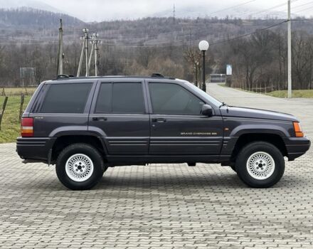 Фиолетовый Джип Гранд Чероки, объемом двигателя 2.5 л и пробегом 300 тыс. км за 5200 $, фото 9 на Automoto.ua