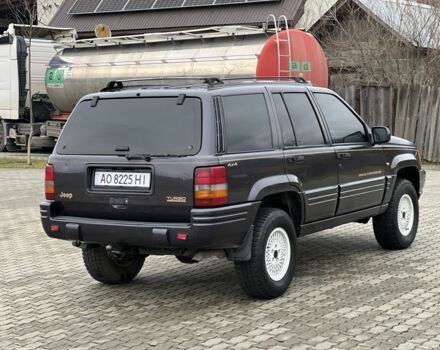 Фиолетовый Джип Гранд Чероки, объемом двигателя 2.5 л и пробегом 300 тыс. км за 5200 $, фото 8 на Automoto.ua