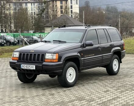 Фиолетовый Джип Гранд Чероки, объемом двигателя 2.5 л и пробегом 300 тыс. км за 5200 $, фото 4 на Automoto.ua