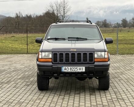 Фиолетовый Джип Гранд Чероки, объемом двигателя 2.5 л и пробегом 300 тыс. км за 5200 $, фото 11 на Automoto.ua