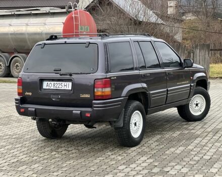 Фиолетовый Джип Гранд Чероки, объемом двигателя 2.5 л и пробегом 300 тыс. км за 5200 $, фото 3 на Automoto.ua