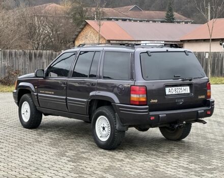 Фиолетовый Джип Гранд Чероки, объемом двигателя 2.5 л и пробегом 300 тыс. км за 5200 $, фото 6 на Automoto.ua