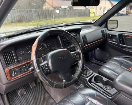 Фиолетовый Джип Гранд Чероки, объемом двигателя 2.5 л и пробегом 300 тыс. км за 5200 $, фото 16 на Automoto.ua