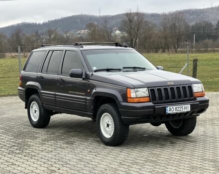 Фиолетовый Джип Гранд Чероки, объемом двигателя 2.5 л и пробегом 300 тыс. км за 5200 $, фото 10 на Automoto.ua