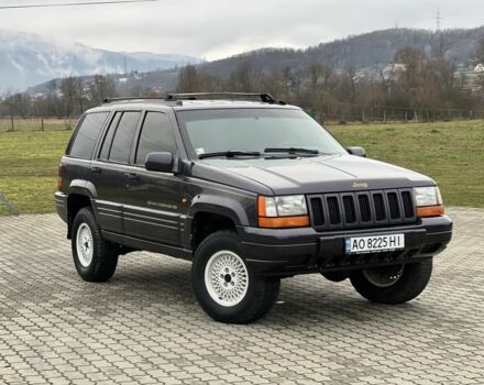 Фиолетовый Джип Гранд Чероки, объемом двигателя 2.5 л и пробегом 300 тыс. км за 5200 $, фото 1 на Automoto.ua