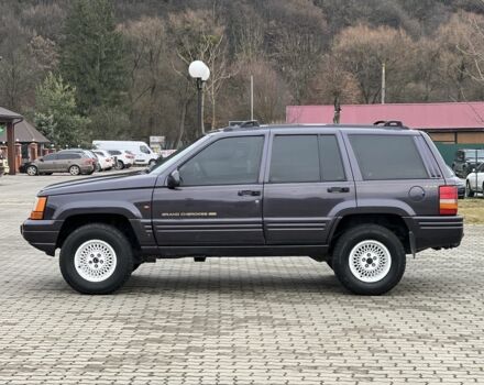 Фиолетовый Джип Гранд Чероки, объемом двигателя 2.5 л и пробегом 300 тыс. км за 5200 $, фото 5 на Automoto.ua