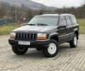 Фиолетовый Джип Гранд Чероки, объемом двигателя 2.5 л и пробегом 300 тыс. км за 5200 $, фото 1 на Automoto.ua