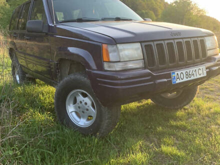 Джип Grand Cherokee 1996 у Мукачеве на Automoto.ua Фіолетовий Джип Grand Cherokee, об'ємом двигуна 4 л та пробігом 360 тис. км за 6040 $, фото 1 на Automoto.ua