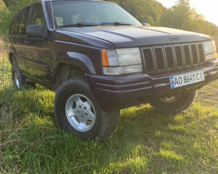 Фіолетовий Джип Grand Cherokee, об'ємом двигуна 4 л та пробігом 360 тис. км за 6035 $, фото 1 на Automoto.ua