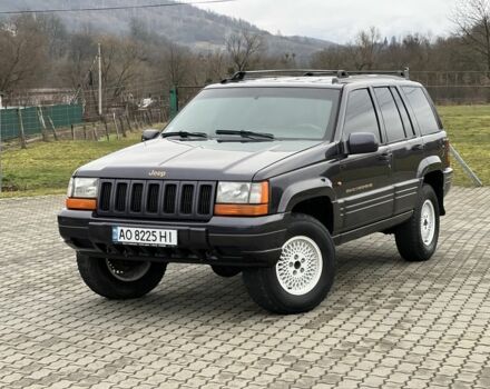 Фиолетовый Джип Гранд Чероки, объемом двигателя 2.5 л и пробегом 300 тыс. км за 5200 $, фото 1 на Automoto.ua