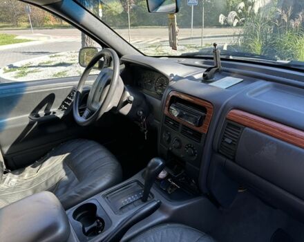 Коричневий Джип Grand Cherokee, об'ємом двигуна 4 л та пробігом 300 тис. км за 1900 $, фото 4 на Automoto.ua