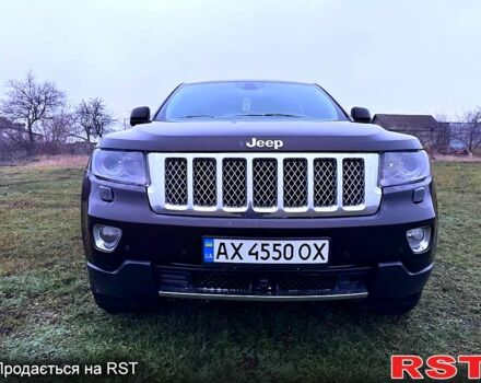 Коричневый Джип Гранд Чероки, объемом двигателя 3 л и пробегом 297 тыс. км за 18000 $, фото 2 на Automoto.ua