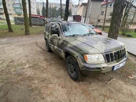 Коричневий Джип Grand Cherokee, об'ємом двигуна 4.7 л та пробігом 300 тис. км за 4767 $, фото 1 на Automoto.ua