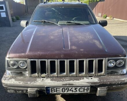 Красный Джип Гранд Чероки, объемом двигателя 5.2 л и пробегом 270 тыс. км за 3100 $, фото 2 на Automoto.ua