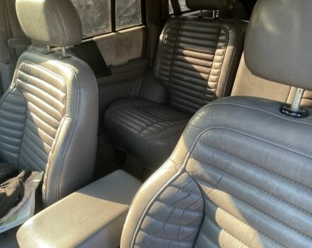 Красный Джип Гранд Чероки, объемом двигателя 5.2 л и пробегом 270 тыс. км за 3100 $, фото 6 на Automoto.ua