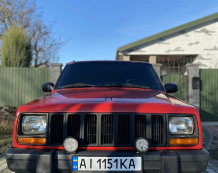 Красный Джип Гранд Чероки, объемом двигателя 4 л и пробегом 193 тыс. км за 7500 $, фото 1 на Automoto.ua