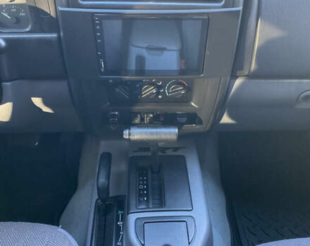 Красный Джип Гранд Чероки, объемом двигателя 4 л и пробегом 193 тыс. км за 7500 $, фото 17 на Automoto.ua