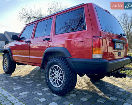 Красный Джип Гранд Чероки, объемом двигателя 4 л и пробегом 193 тыс. км за 7500 $, фото 2 на Automoto.ua