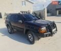 Червоний Джип Grand Cherokee, об'ємом двигуна 2.5 л та пробігом 250 тис. км за 7500 $, фото 2 на Automoto.ua