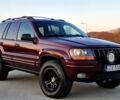 Красный Джип Гранд Чероки, объемом двигателя 3 л и пробегом 210 тыс. км за 2750 $, фото 1 на Automoto.ua