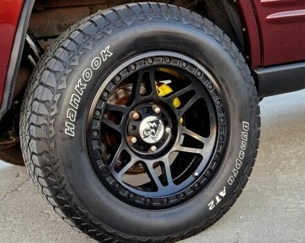 Красный Джип Гранд Чероки, объемом двигателя 3 л и пробегом 210 тыс. км за 2750 $, фото 6 на Automoto.ua