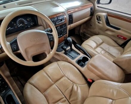 Красный Джип Гранд Чероки, объемом двигателя 3 л и пробегом 210 тыс. км за 2750 $, фото 7 на Automoto.ua