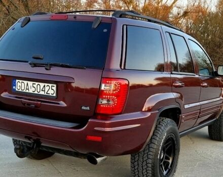 Красный Джип Гранд Чероки, объемом двигателя 3 л и пробегом 210 тыс. км за 2750 $, фото 3 на Automoto.ua