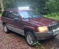 Червоний Джип Grand Cherokee, об'ємом двигуна 4 л та пробігом 237 тис. км за 6000 $, фото 1 на Automoto.ua
