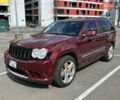 Червоний Джип Grand Cherokee, об'ємом двигуна 6.1 л та пробігом 178 тис. км за 15500 $, фото 1 на Automoto.ua