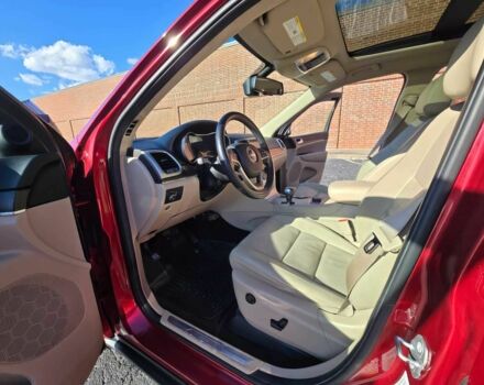 Джип Grand Cherokee 2014 у Львові на Automoto.ua Червоний Джип Grand Cherokee, об'ємом двигуна 3 л та пробігом 86 тис. км за 15600 $, фото 8 на Automoto.ua