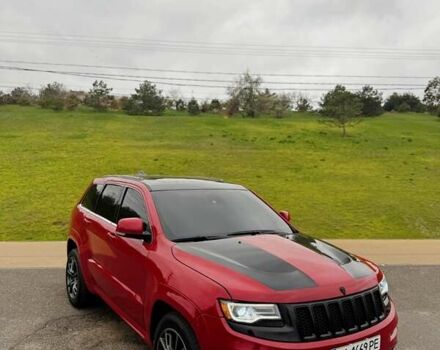 Красный Джип Гранд Чероки, объемом двигателя 6.4 л и пробегом 177 тыс. км за 31900 $, фото 1 на Automoto.ua