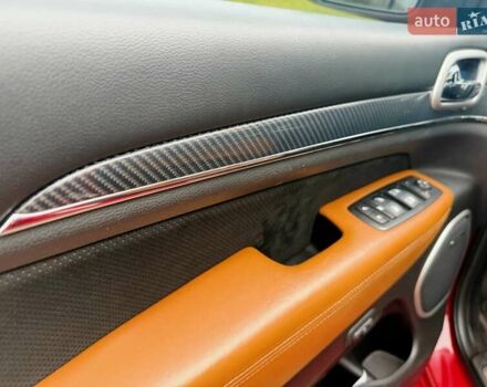 Красный Джип Гранд Чероки, объемом двигателя 6.4 л и пробегом 177 тыс. км за 31900 $, фото 8 на Automoto.ua