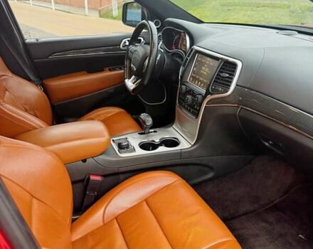 Красный Джип Гранд Чероки, объемом двигателя 6.4 л и пробегом 177 тыс. км за 31900 $, фото 18 на Automoto.ua