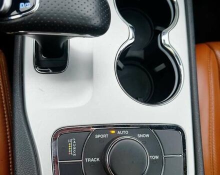 Красный Джип Гранд Чероки, объемом двигателя 6.4 л и пробегом 177 тыс. км за 31900 $, фото 26 на Automoto.ua