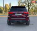 Червоний Джип Grand Cherokee, об'ємом двигуна 5.65 л та пробігом 99 тис. км за 33700 $, фото 2 на Automoto.ua