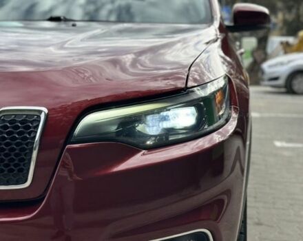 Красный Джип Гранд Чероки, объемом двигателя 2.4 л и пробегом 99 тыс. км за 19800 $, фото 2 на Automoto.ua