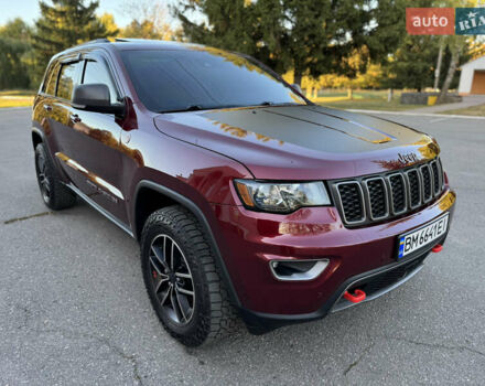 Червоний Джип Grand Cherokee, об'ємом двигуна 5.65 л та пробігом 99 тис. км за 33700 $, фото 17 на Automoto.ua