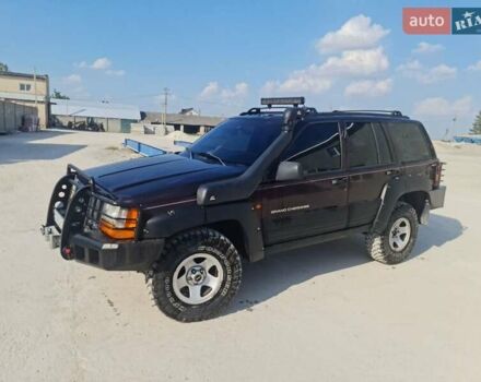 Червоний Джип Grand Cherokee, об'ємом двигуна 2.5 л та пробігом 250 тис. км за 7500 $, фото 1 на Automoto.ua