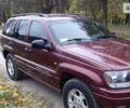 Червоний Джип Grand Cherokee, об'ємом двигуна 4 л та пробігом 153 тис. км за 8100 $, фото 1 на Automoto.ua