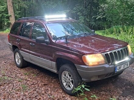 Червоний Джип Grand Cherokee, об'ємом двигуна 4 л та пробігом 237 тис. км за 6000 $, фото 1 на Automoto.ua