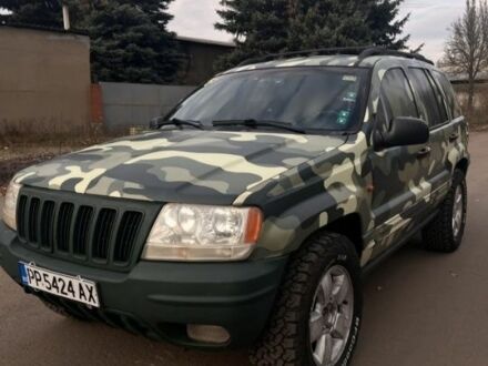 Червоний Джип Grand Cherokee, об'ємом двигуна 3 л та пробігом 2 тис. км за 6000 $, фото 1 на Automoto.ua