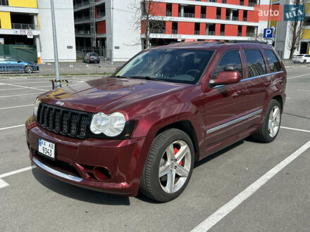 Червоний Джип Grand Cherokee, об'ємом двигуна 6.1 л та пробігом 178 тис. км за 15500 $, фото 1 на Automoto.ua
